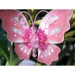 Papillon rose avec perles...